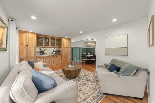 a living room with furniture and a table