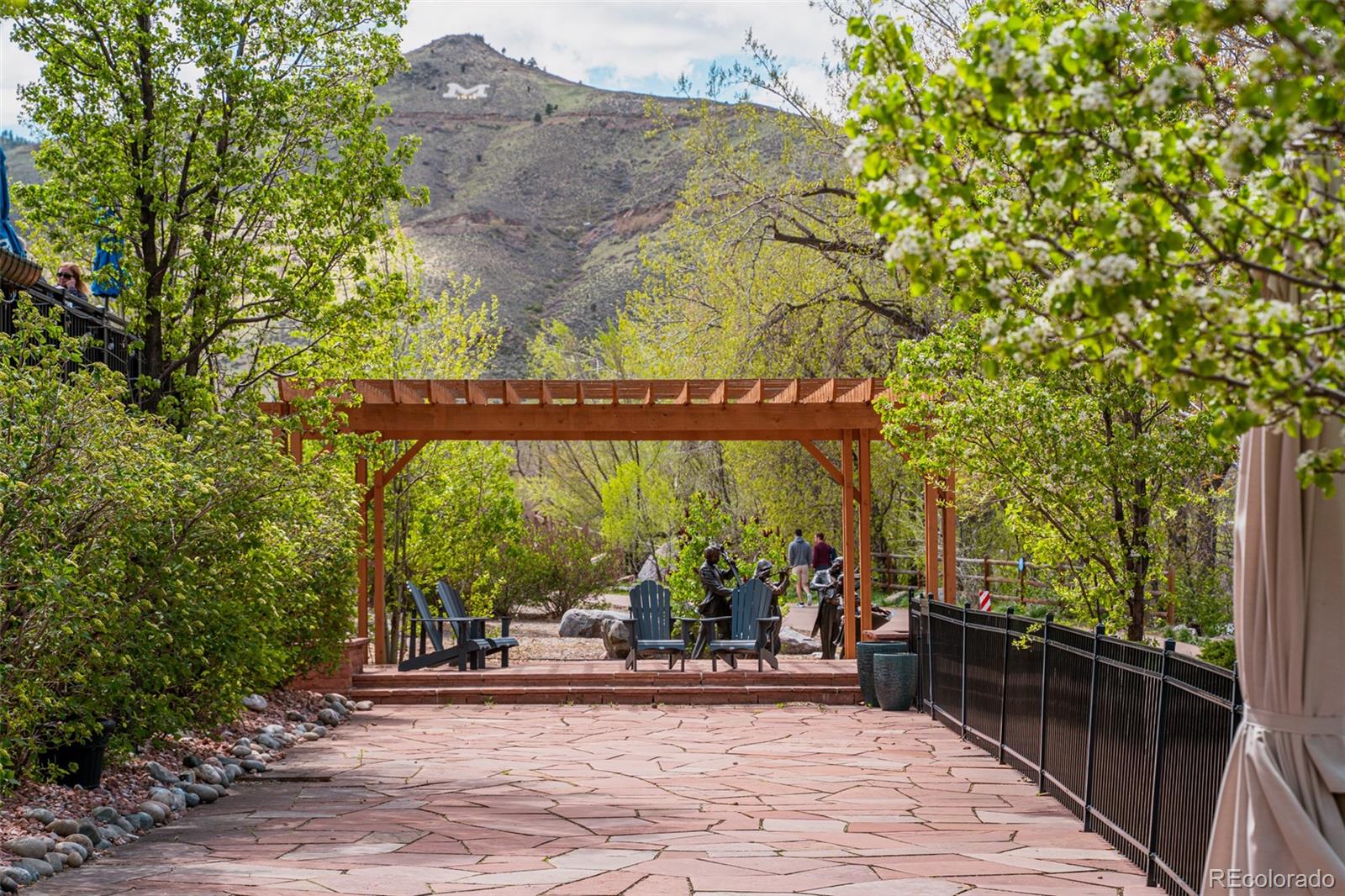 14455 Anvil Way Golden, CO 80403 - Photo 23 of 35 a view of a chairs and table in the patio