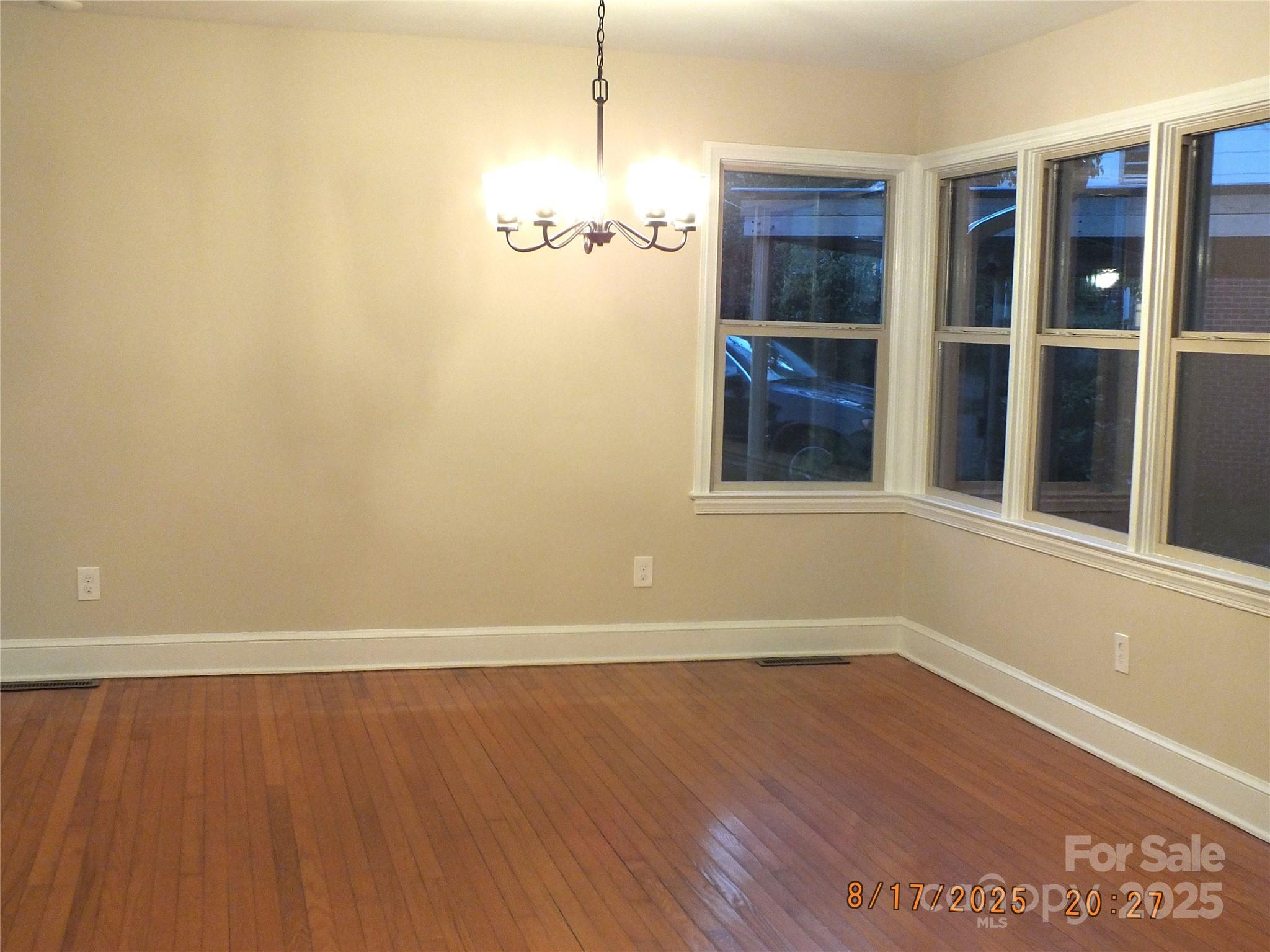 414 West Springs Street Lancaster, SC 29720 - Photo 2 of 27 wooden floor in an empty room with a window