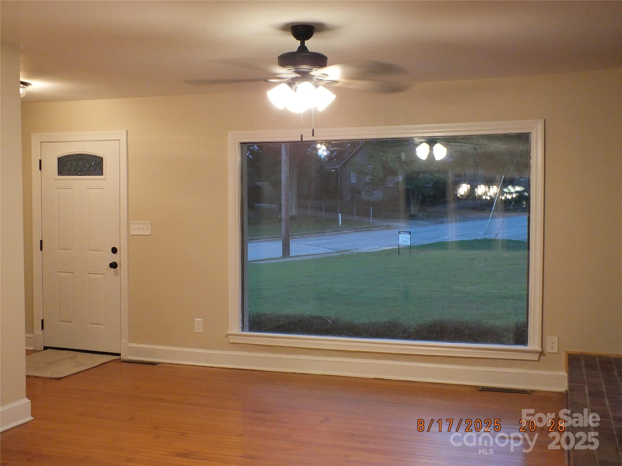 414 West Springs Street Lancaster, SC 29720 - Photo 7 of 27 a view of a room that has a window and a glass door