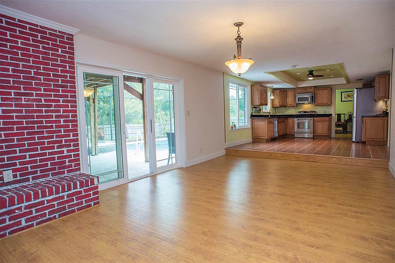 503 Royal Road St. Augustine, FL 32086 - Photo 10 of 34 a view of an empty room with window and wooden floor