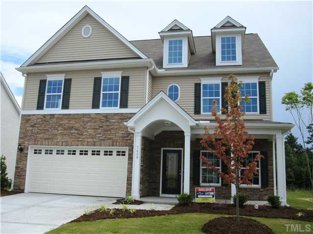 7608 Birchmoor Way, Unit LT75 Raleigh, NC 27616 - Photo 1 of 12 a front view of a house with a yard