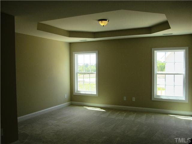 7608 Birchmoor Way, Unit LT75 Raleigh, NC 27616 - Photo 11 of 12 a view of an empty room with a window