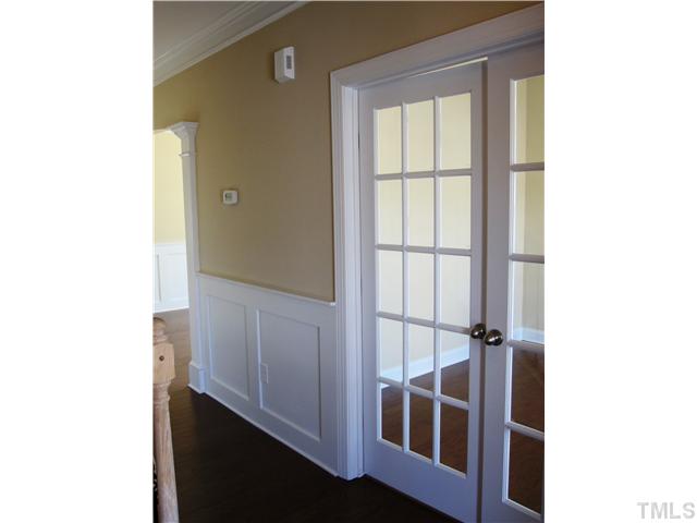 7608 Birchmoor Way, Unit LT75 Raleigh, NC 27616 - Photo 2 of 12 a view of walk in closet with empty racks