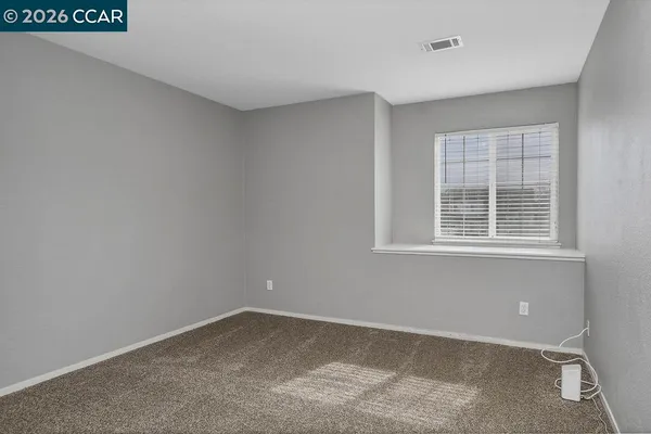 an empty room with a window