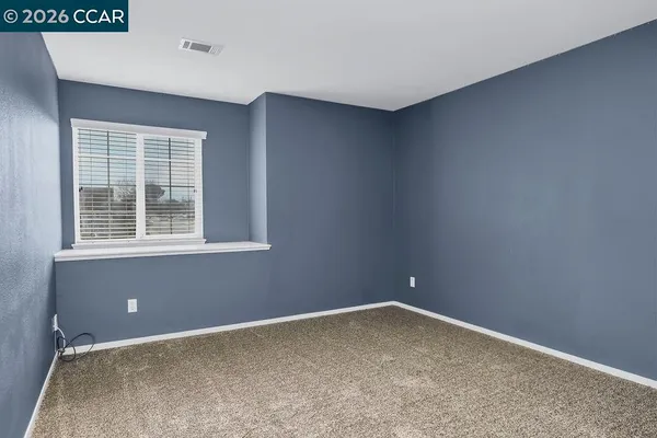 an empty room with a window