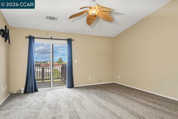 an empty room with sliding door