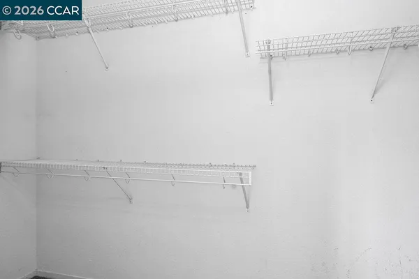 a view of small space with racks on the wall