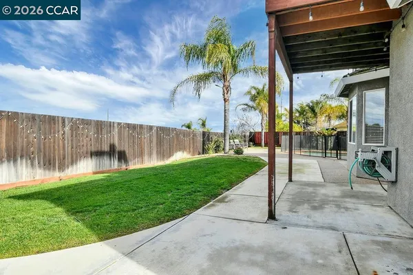 a view of a porch with a big yard
