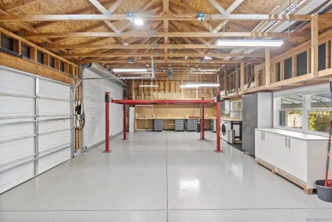 a view of an empty room with cabinet