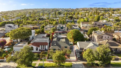 an aerial view of residential building and parking space