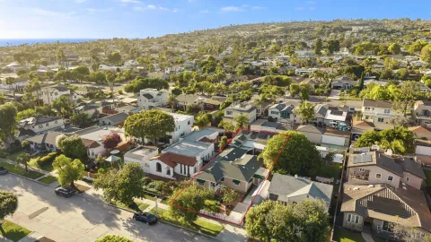 an aerial view of residential building with parking space