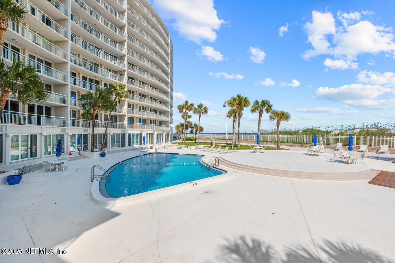 1601 Ocean Drive South, Unit 309 Jacksonville Beach, FL 32250 - Photo 16 of 18 a view of tall buildings and a street