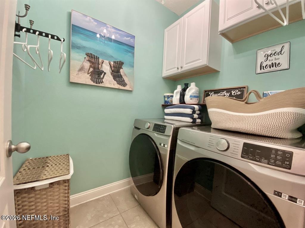115 Sierras Loop St. Augustine, FL 32086 - Photo 32 of 65 a utility room with dryer and washer