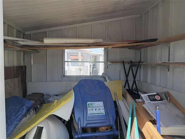 a workspace with furniture and window