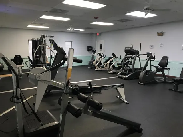 a view of a chairs and table in the patio