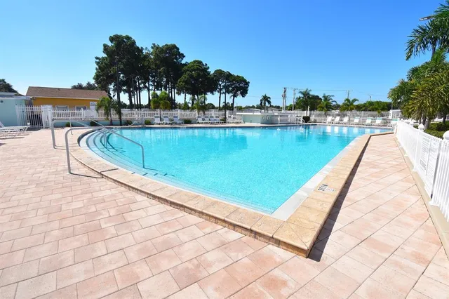 a view of balcony with wooden floor