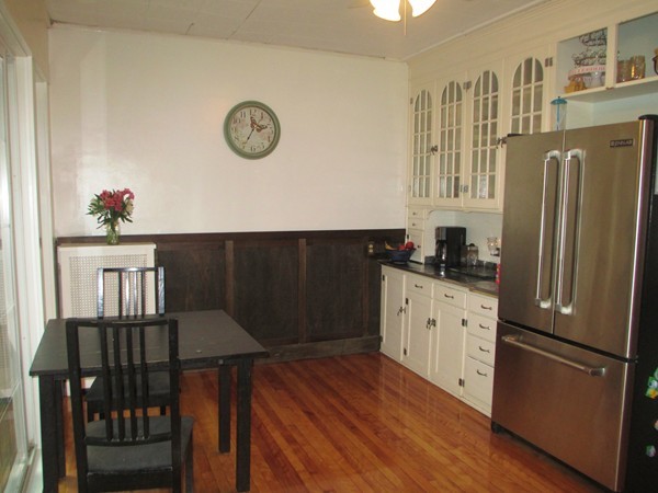 25 Colonial Road Worcester, MA 01602 - Photo 11 of 21 a kitchen with granite countertop a refrigerator a stove a sink and cabinets