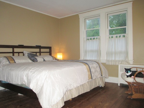 25 Colonial Road Worcester, MA 01602 - Photo 19 of 21 a bedroom with a bed and wooden floor