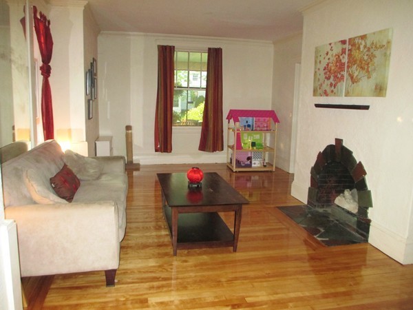 25 Colonial Road Worcester, MA 01602 - Photo 7 of 21 a living room with furniture and a wooden floor