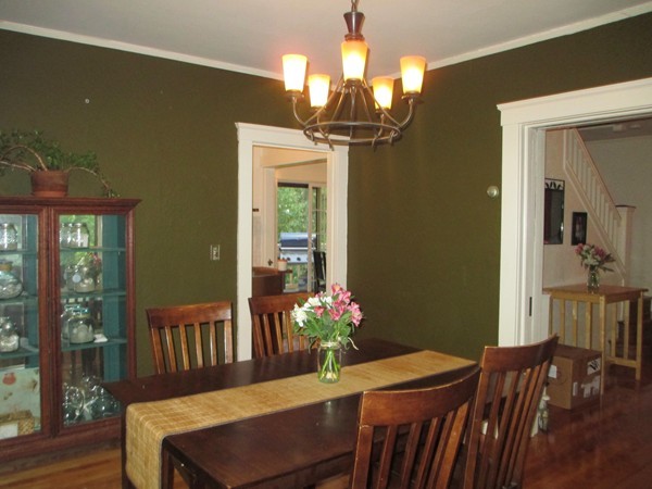 25 Colonial Road Worcester, MA 01602 - Photo 8 of 21 a dining room with furniture a chandelier and wooden floor