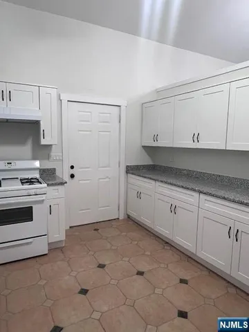 a view white cabinets and window
