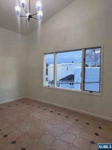 a bathroom with a sink a mirror and a toilet