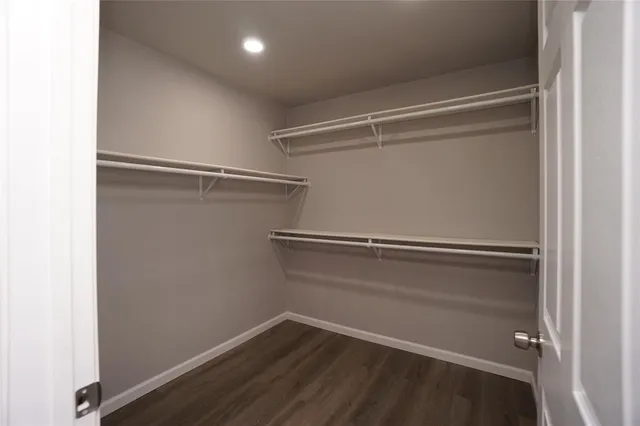 a view of an empty walk in closet