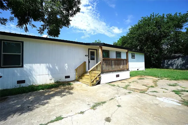 a view of a house with a patio