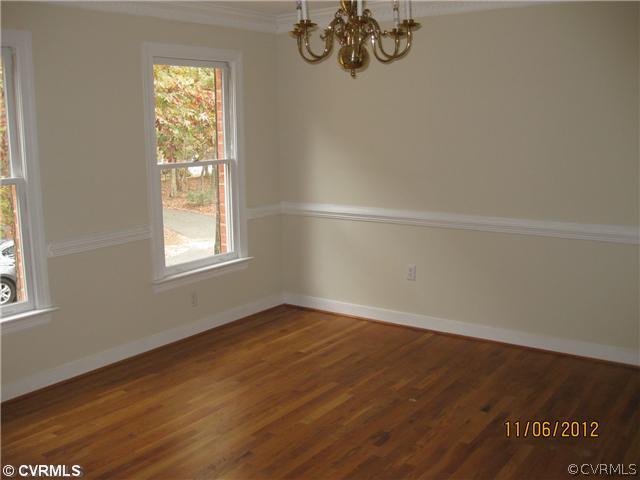 1665 Huntingdon Road Crozier, VA 23039 - Photo 2 of 6 an empty room with a window