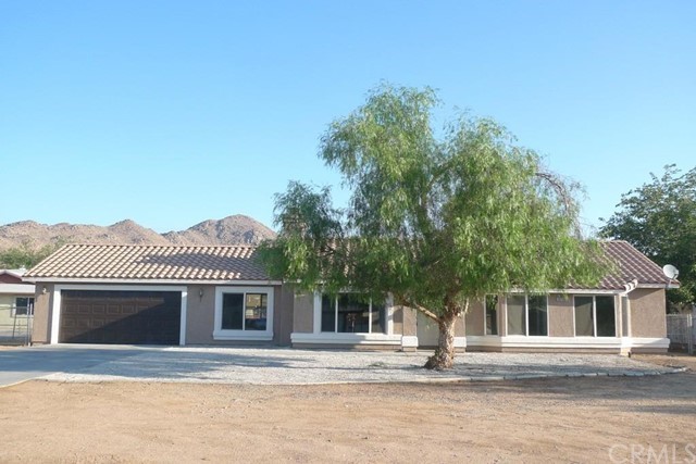20220 Rimrock Road East Apple Valley, CA 92307 - Photo 1 of 1 a front view of a house
