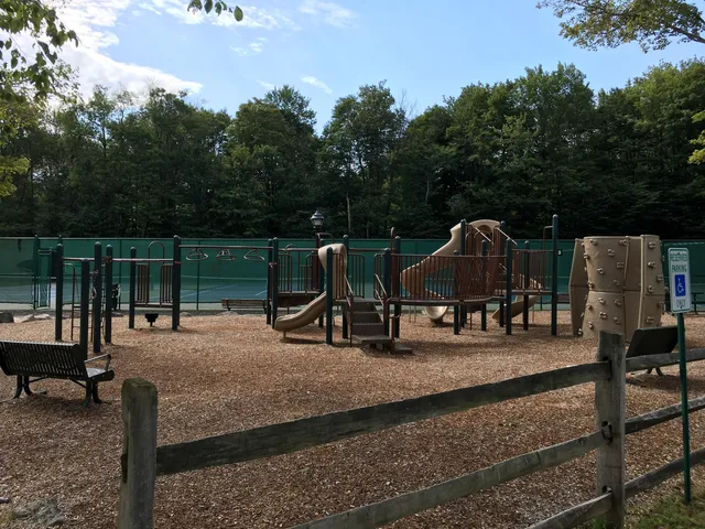 a patio with a patio table and chairs