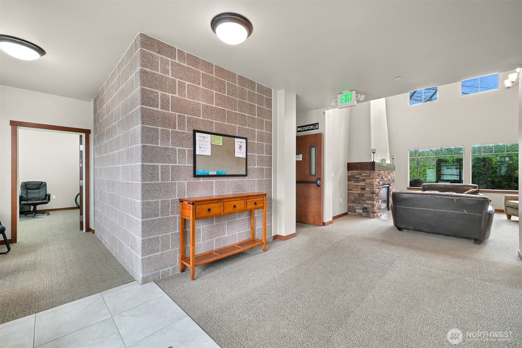 8844 Depot Road, Unit B101 Lynden, WA 98264 - Photo 16 of 30 a living room with furniture and a flat screen tv