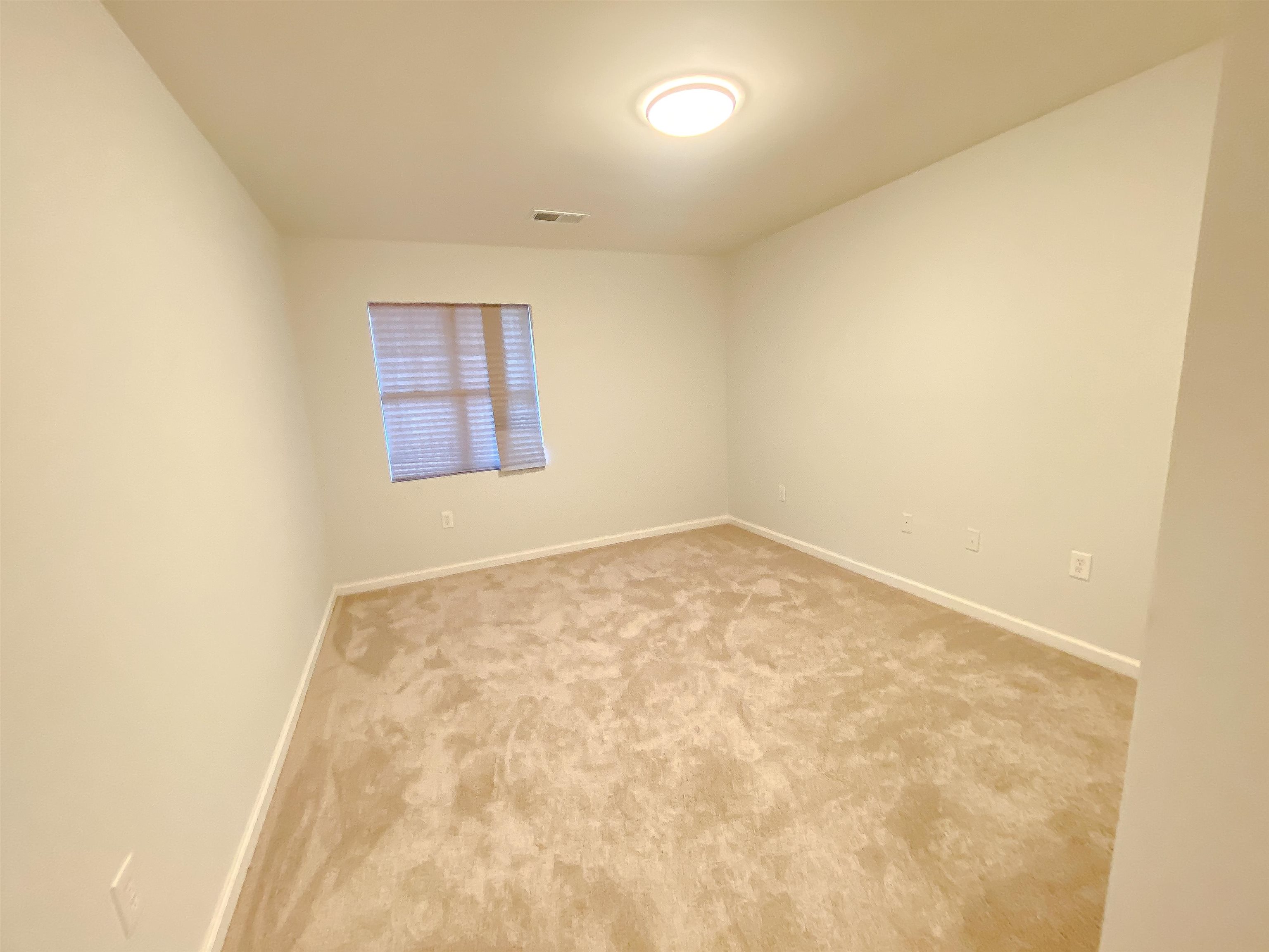 157 Pickett Road Memphis, TN 38109 - Photo 18 of 24 an empty room with a window