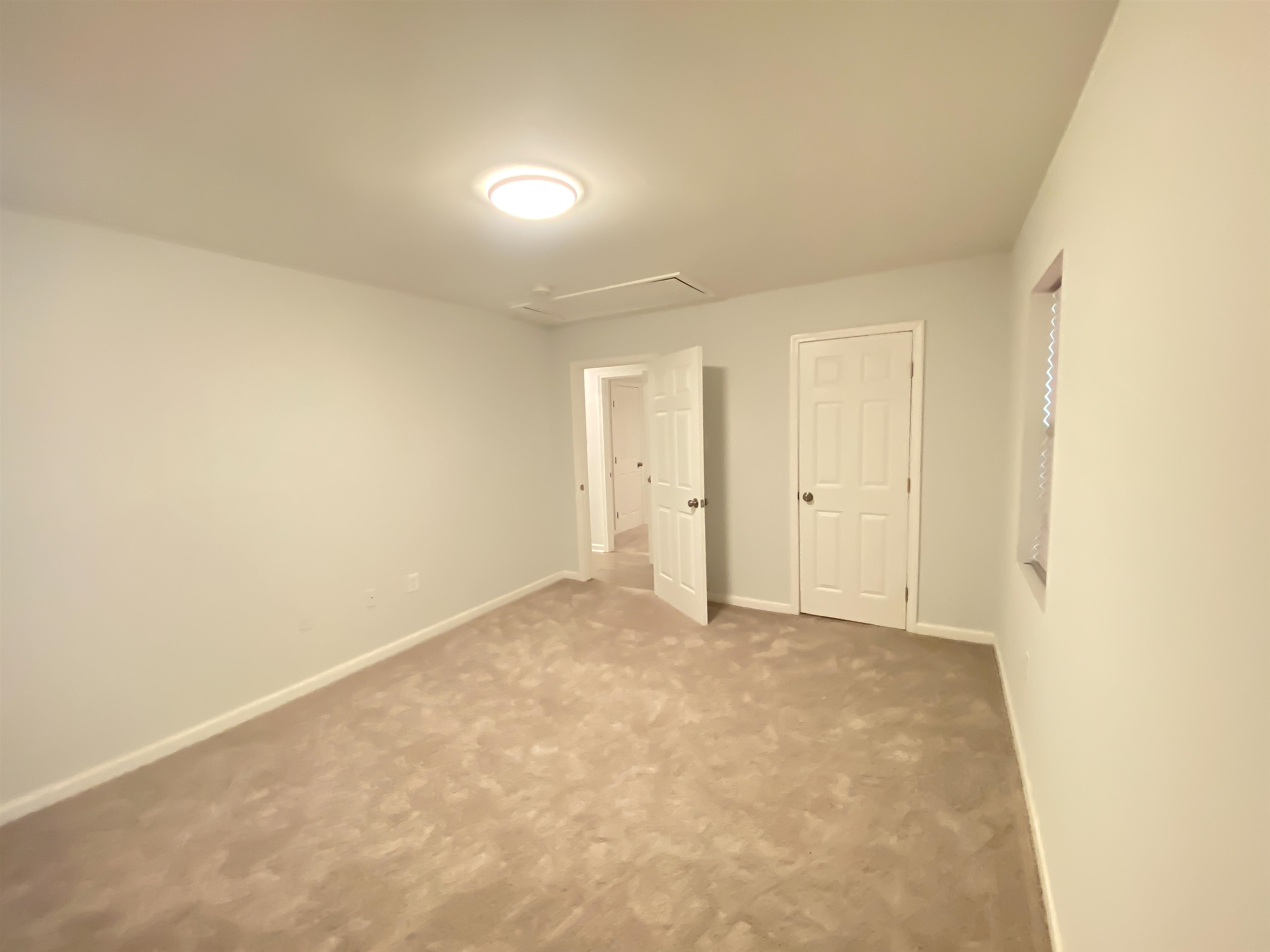 157 Pickett Road Memphis, TN 38109 - Photo 20 of 24 a view of an empty room and window