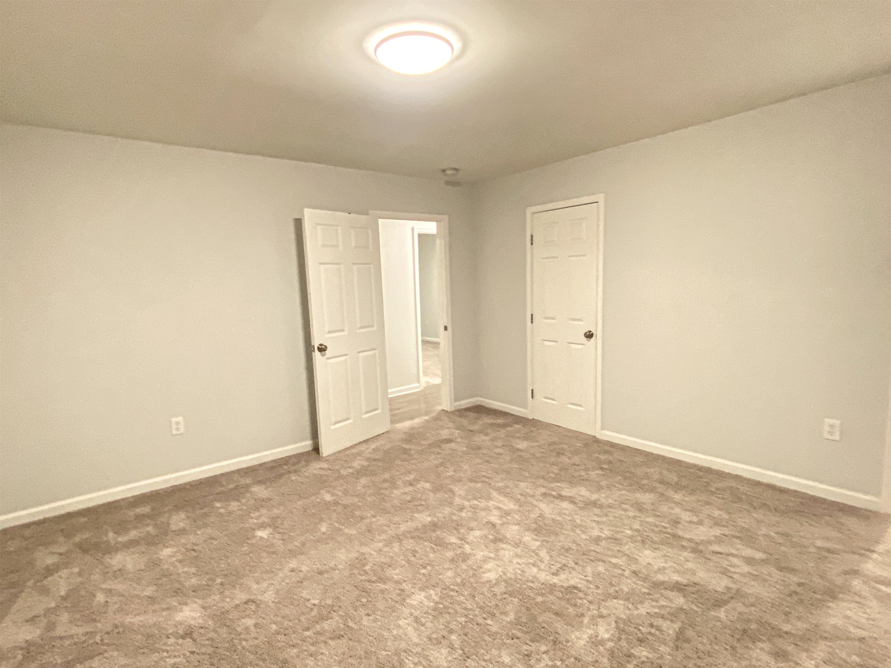 157 Pickett Road Memphis, TN 38109 - Photo 21 of 24 an empty room with an entryway