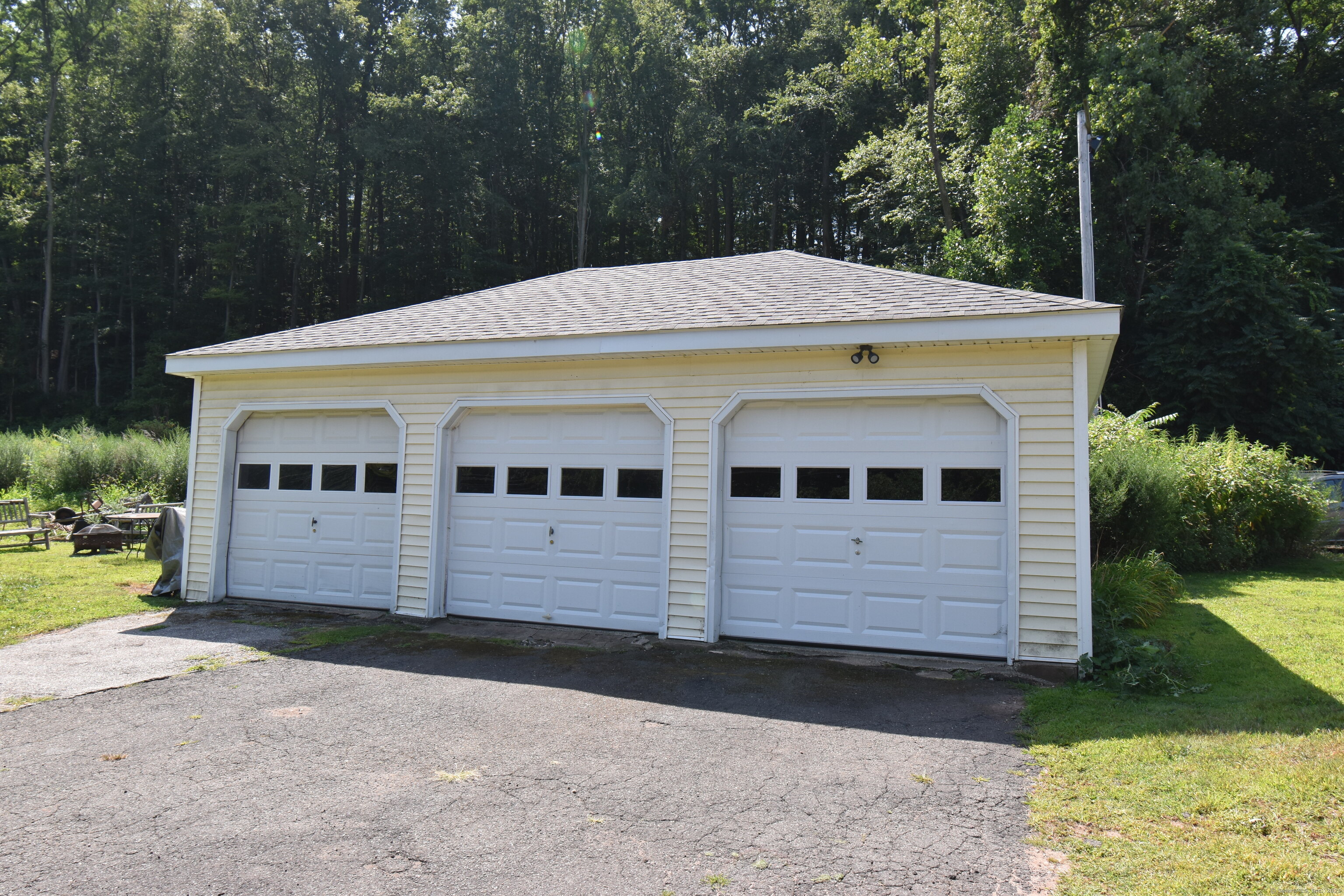 1197 Prospect Road Prospect, CT 06712 - Photo 21 of 21 a view of a white house with a yard