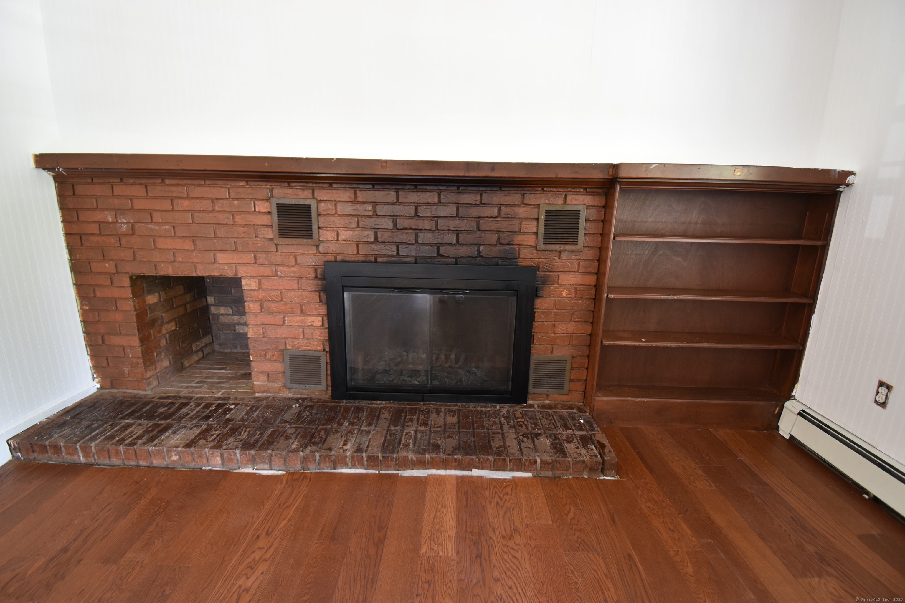 1197 Prospect Road Prospect, CT 06712 - Photo 6 of 21 a living room with a fireplace