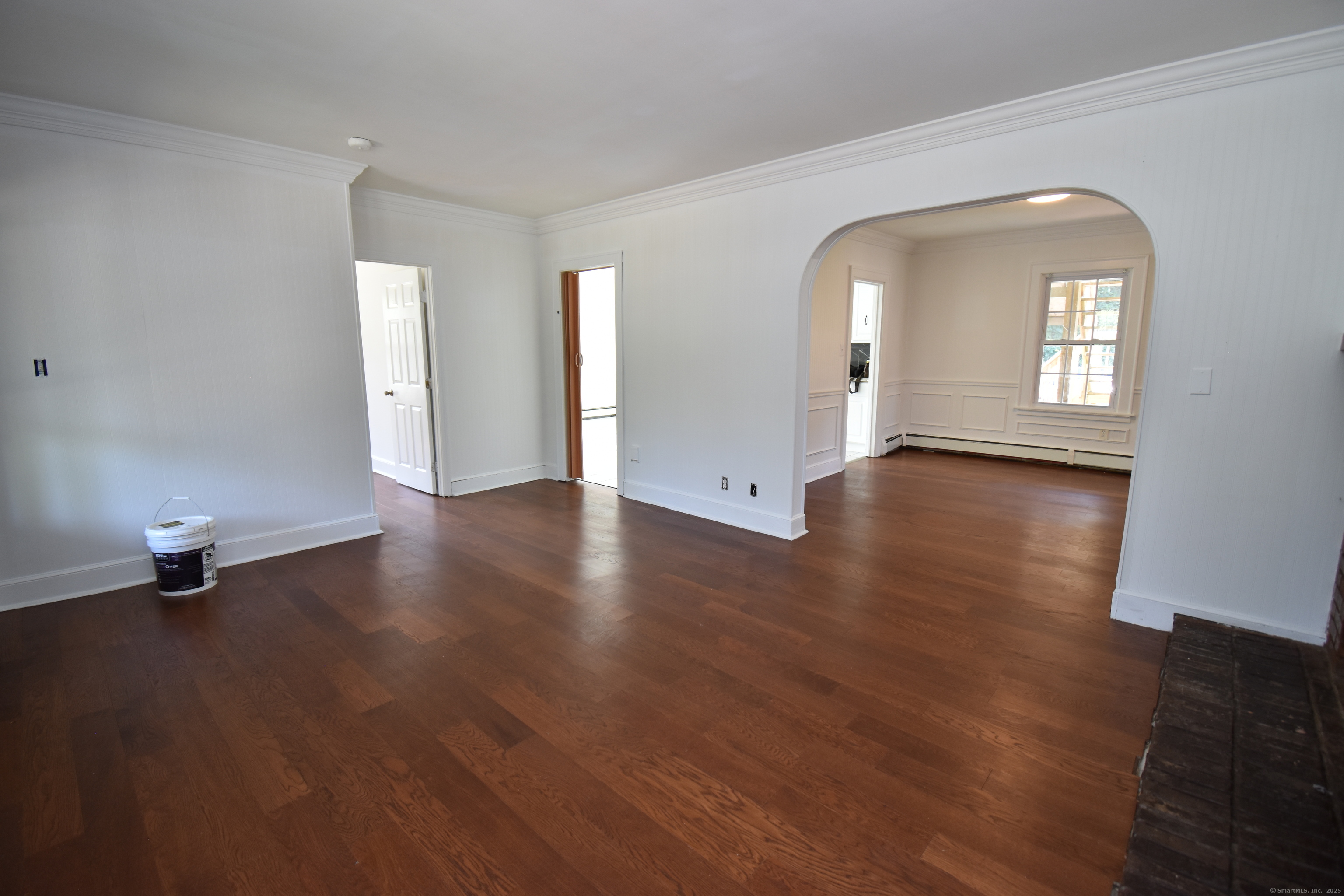 1197 Prospect Road Prospect, CT 06712 - Photo 9 of 21 an empty room with wooden floor and windows