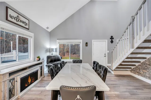 a view of a living room and dining room