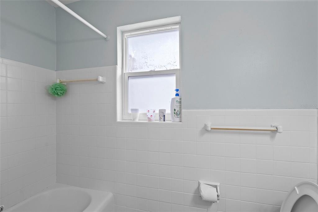 2343 Prospect Street Sarasota, FL 34239 - Photo 14 of 33 a bathroom with a shower