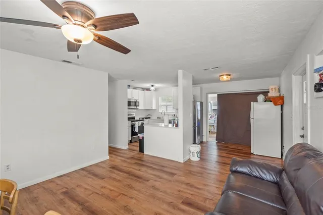 a view of a livingroom with a furniture