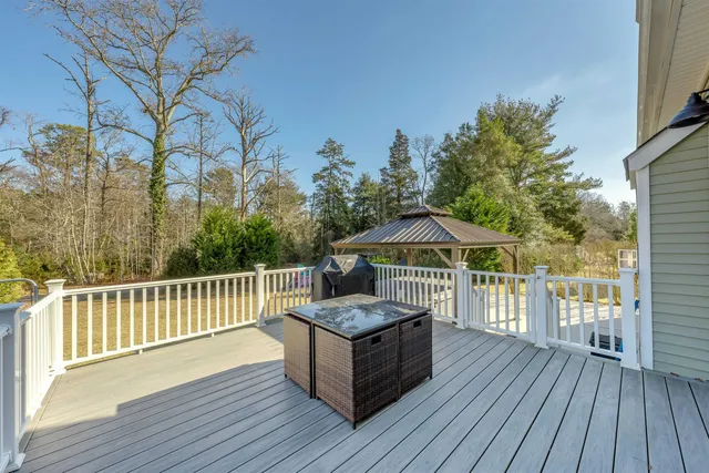 a view of a house with a road