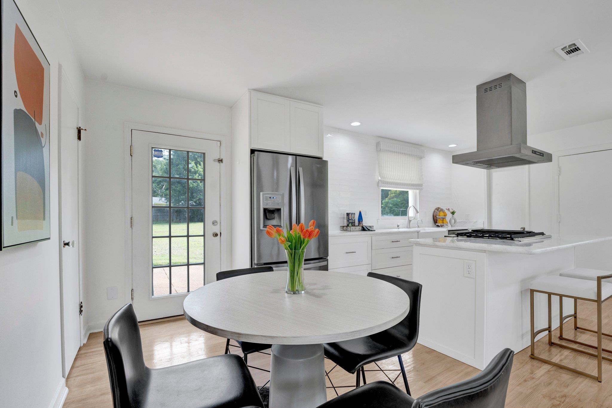 1326 Walton Road Memphis, TN 38117 - Photo 8 of 20 a view of a dining room with furniture window and outside view