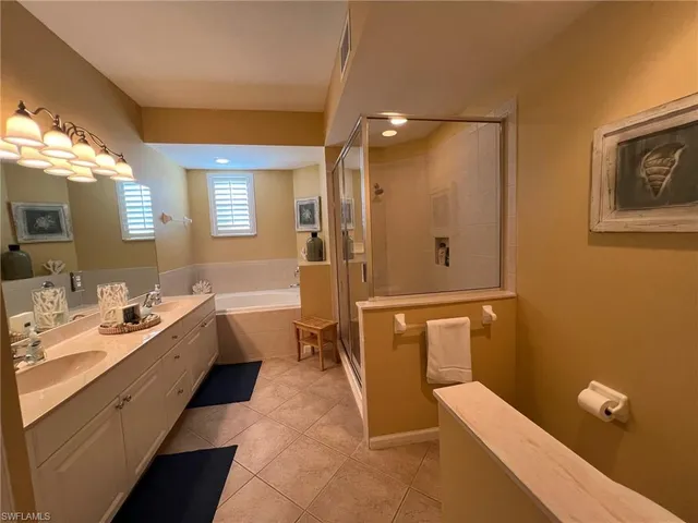 a bathroom with a shower and toilet