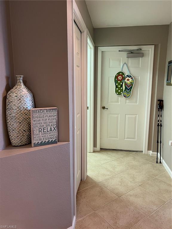 6864 Ascot Drive, Unit 101 Naples, FL 34113 - Photo 24 of 40 a view of entryway with a rug