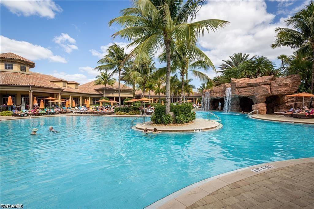 6864 Ascot Drive, Unit 101 Naples, FL 34113 - Photo 33 of 40 a view of a house with a yard