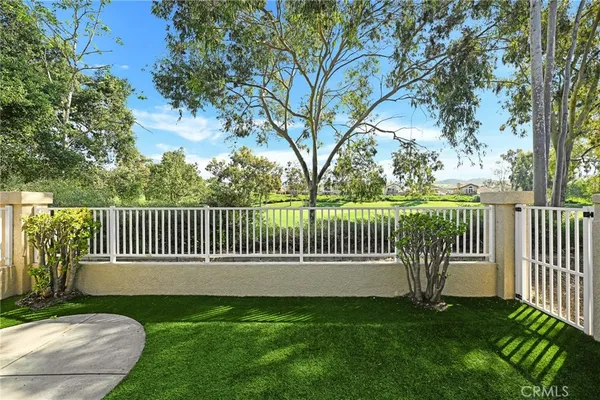 a view of a deck with a fence