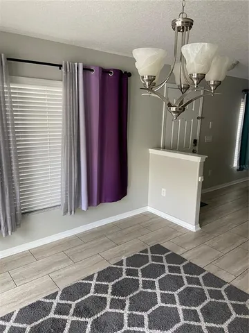 a view of a livingroom with wooden floor