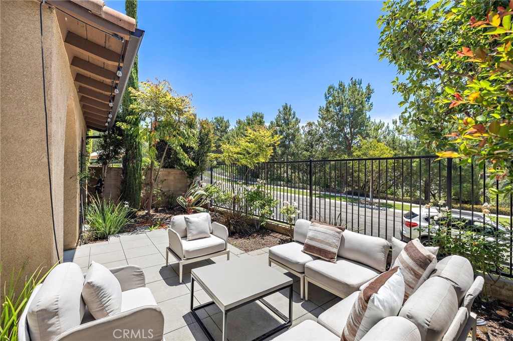 47 Tuscany Ladera Ranch, CA 92694 - Photo 23 of 28 a view of a patio with couches chairs and potted plants